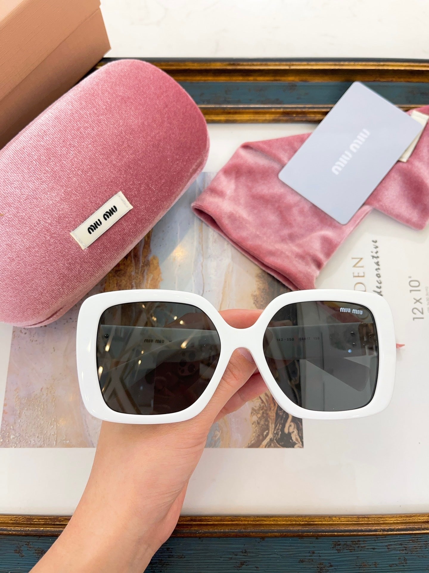 MIU M SUNGLASSES