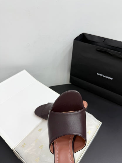 AMINA M HEELS
