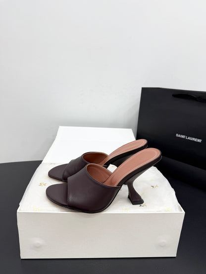 AMINA M HEELS