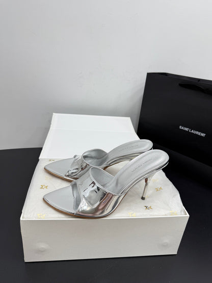 AMINA M HEELS