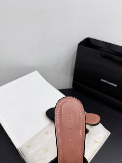 AMINA M HEELS