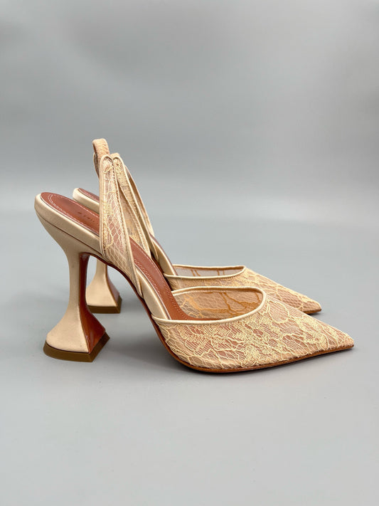 AMINA M HEELS