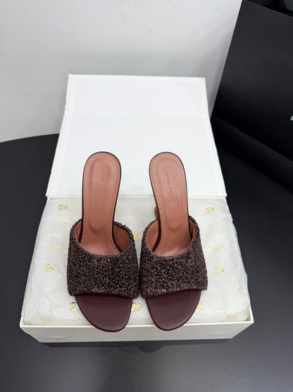 AMINA M HEELS