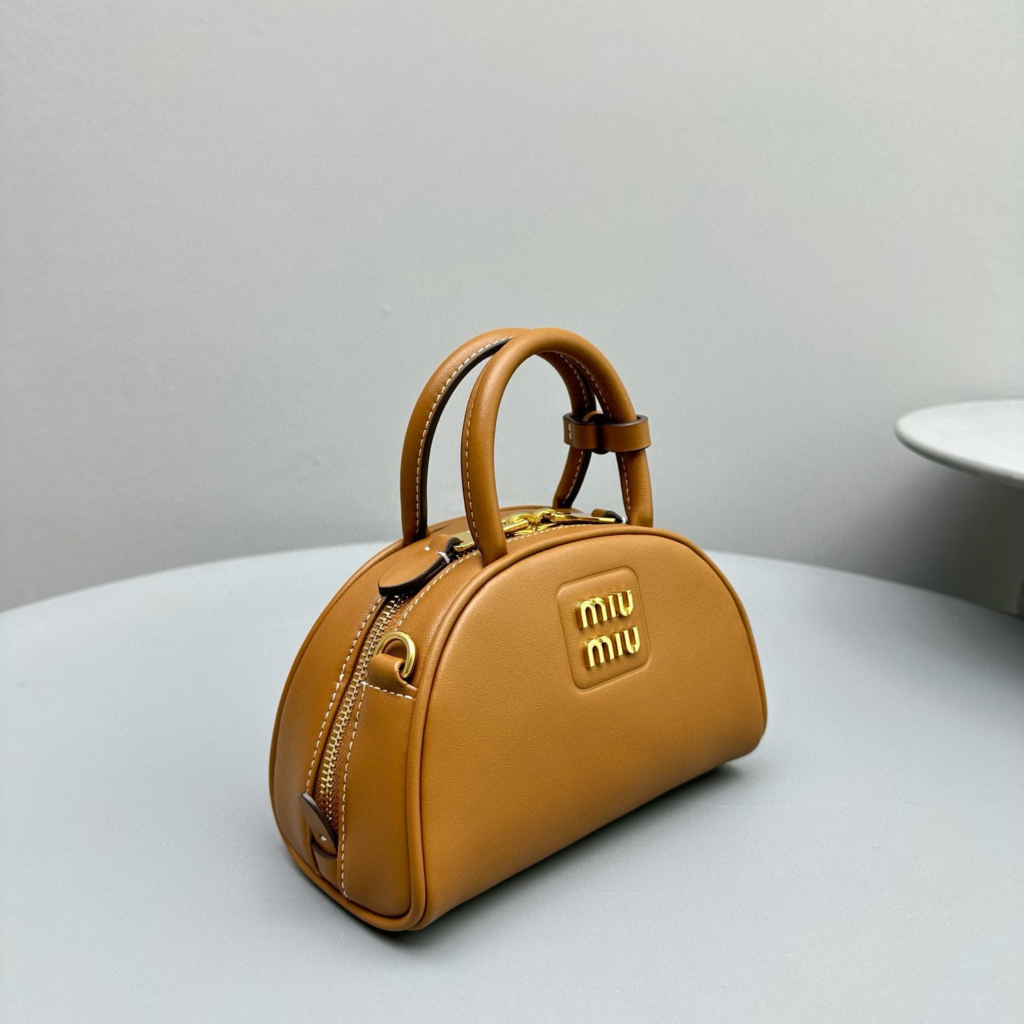 MIU M LEATHER TOP HANDLE BAG