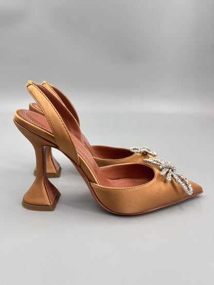 AMINA M HEELS