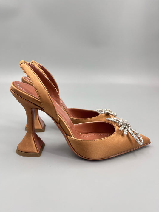 AMINA M HEELS