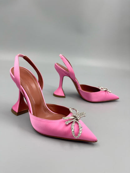 AMINA M HEELS