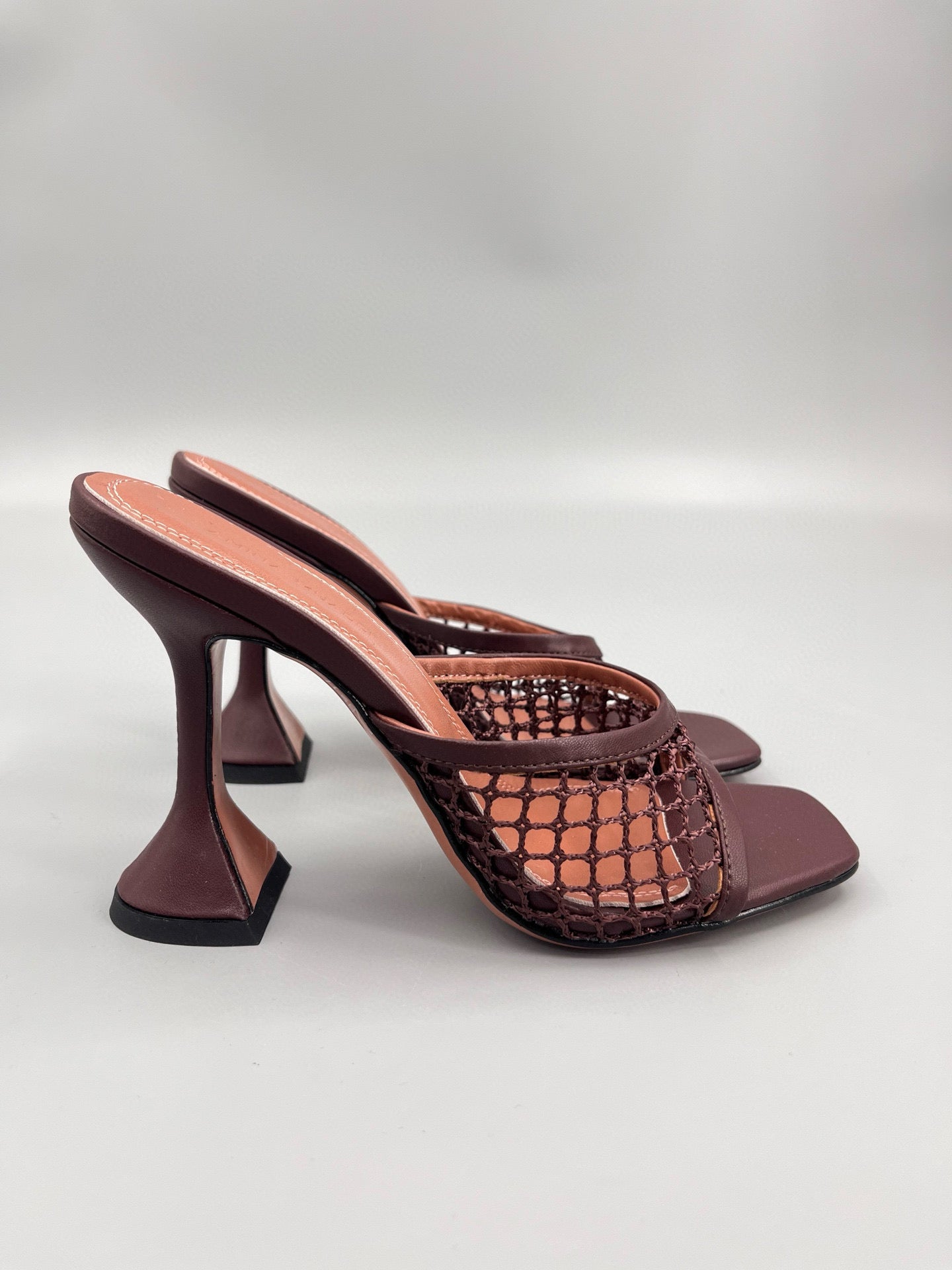 AMINA M HEELS