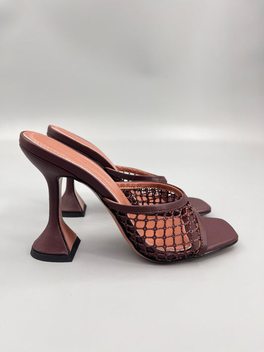 AMINA M HEELS