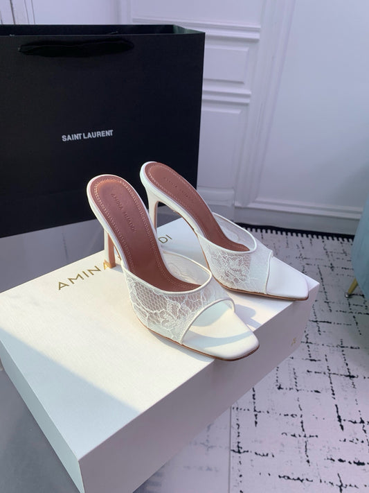 AMINA M HEELS