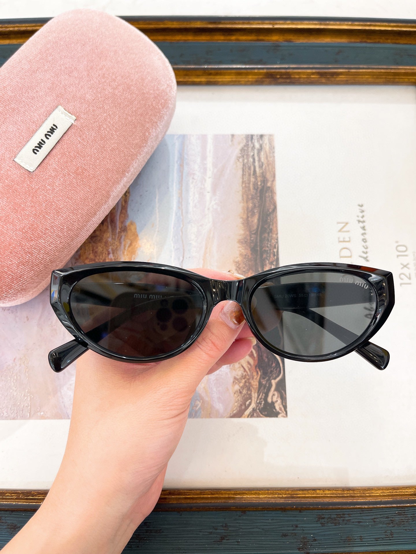 MIU M SUNGLASSES