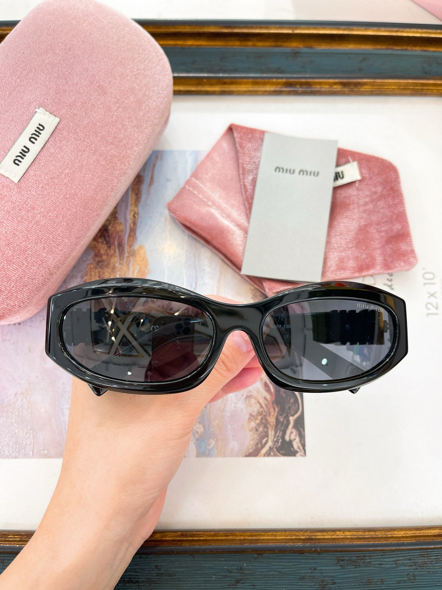 MIU M SUNGLASSES