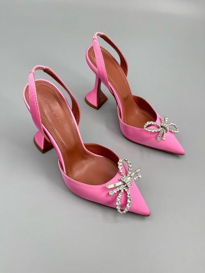 AMINA M HEELS