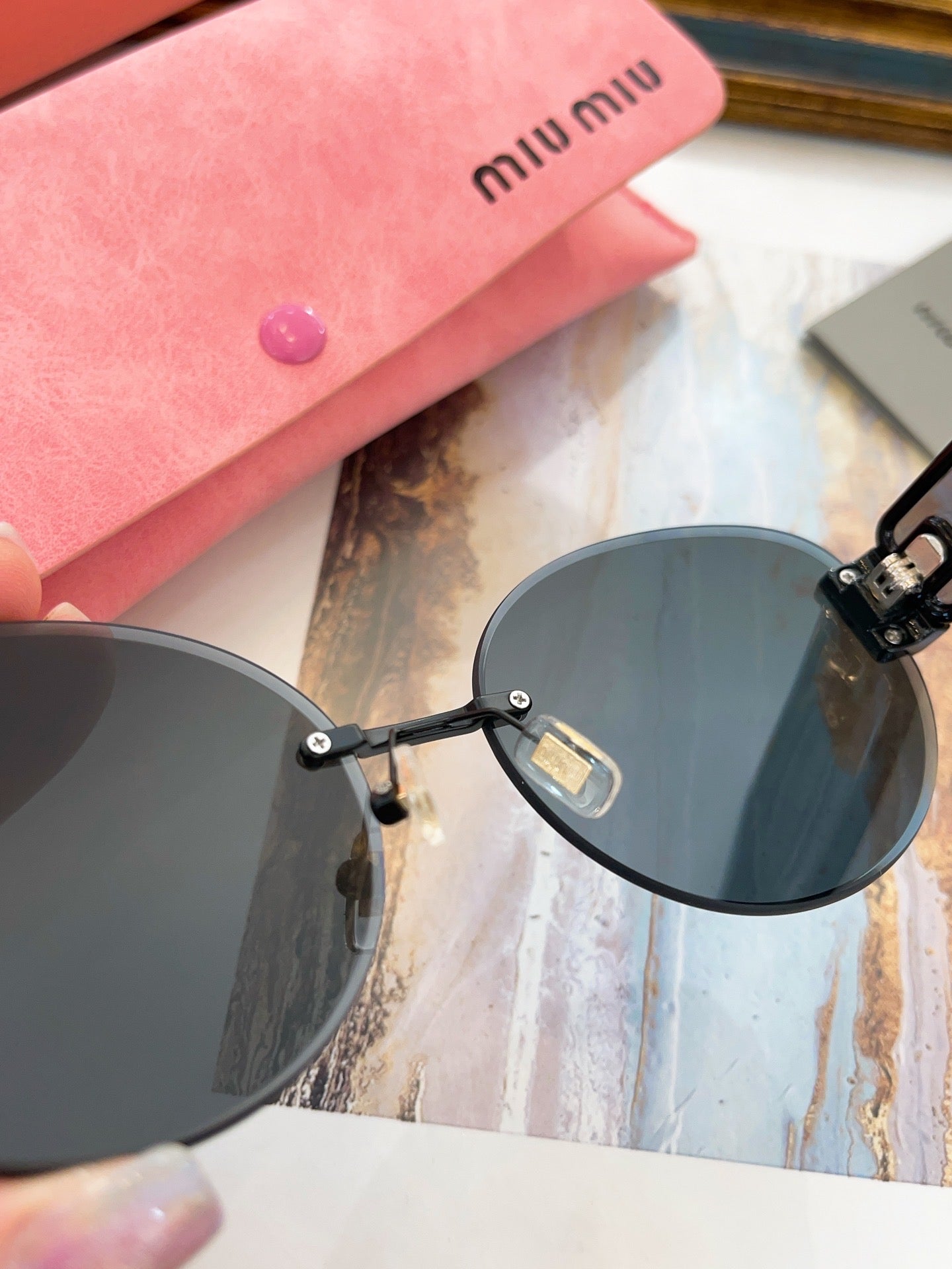 MIU M SUNGLASSES