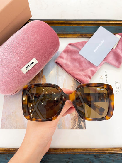 MIU M SUNGLASSES