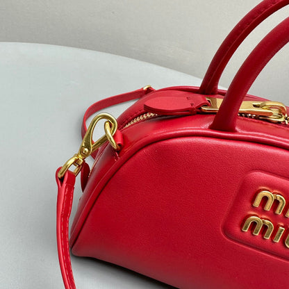 MIU M LEATHER TOP HANDLE BAG