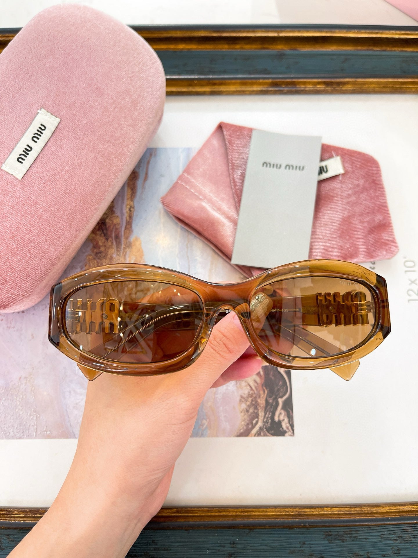 MIU M SUNGLASSES