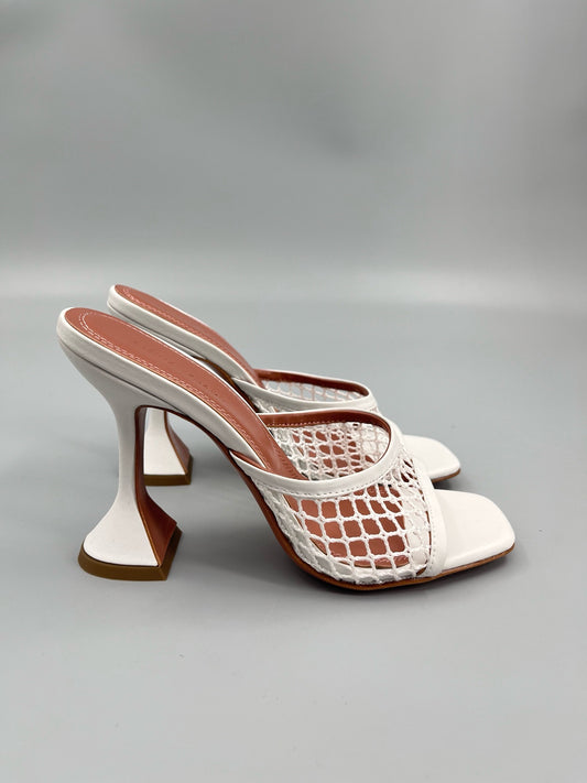 AMINA M HEELS