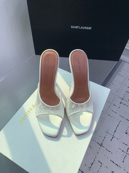 AMINA M HEELS