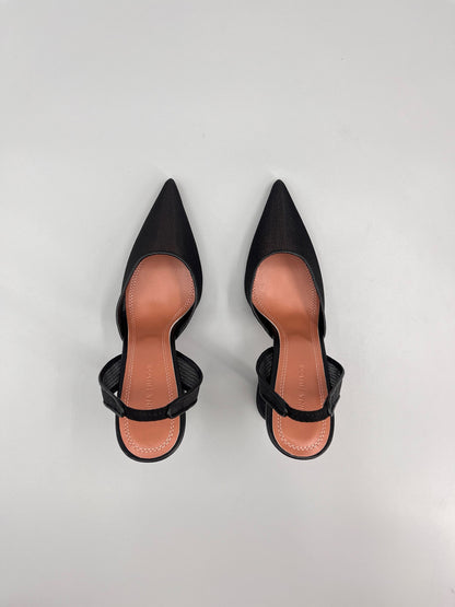 AMINA M HEELS