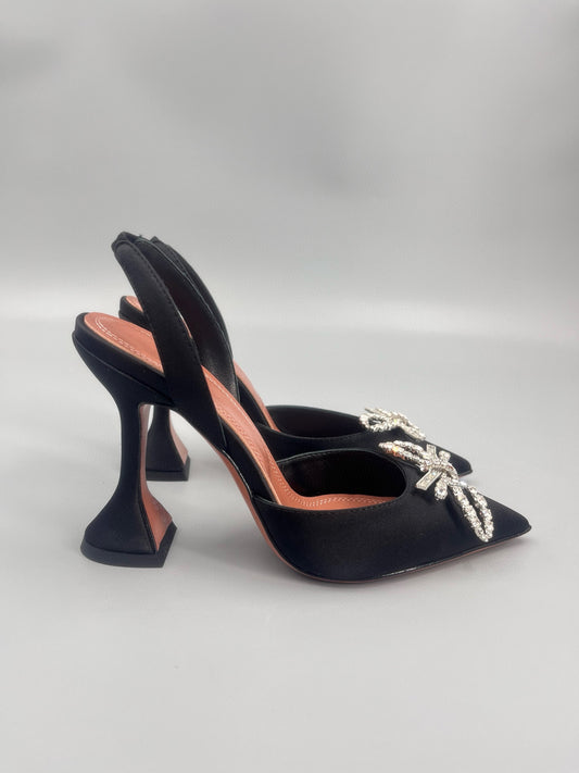 AMINA M HEELS
