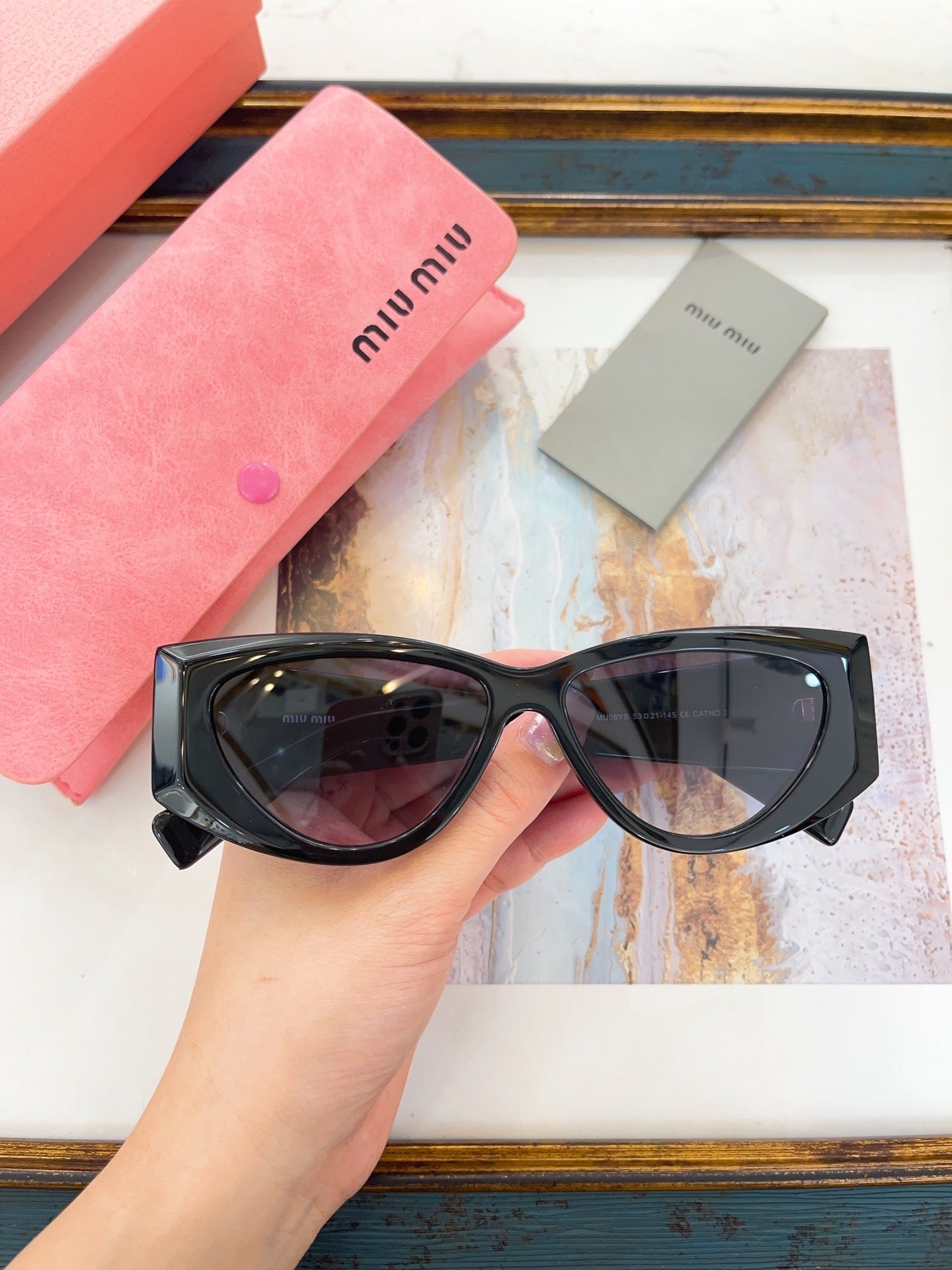 MIU M SUNGLASSES