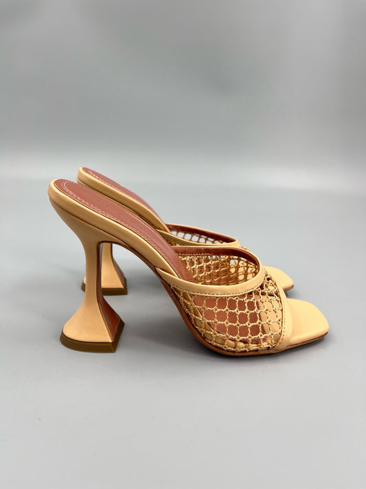 AMINA M HEELS
