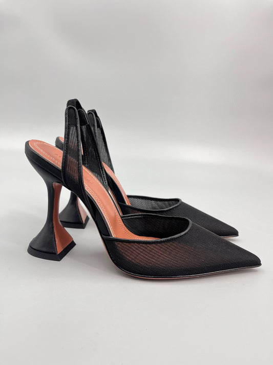 AMINA M HEELS
