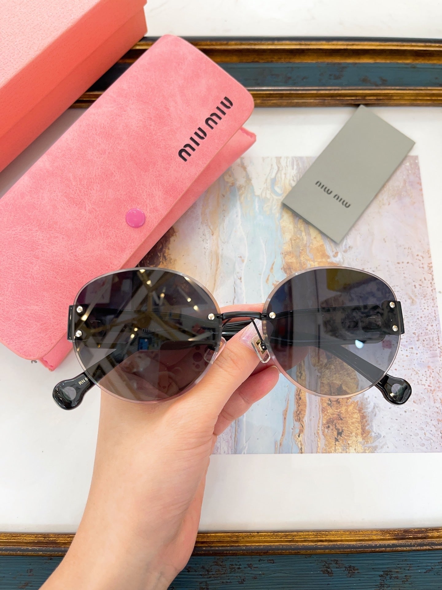 MIU M SUNGLASSES