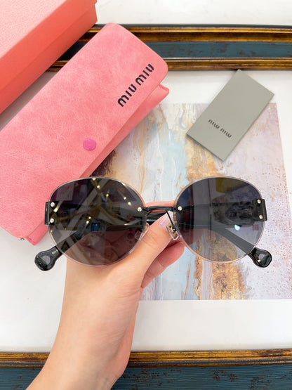 MIU M SUNGLASSES