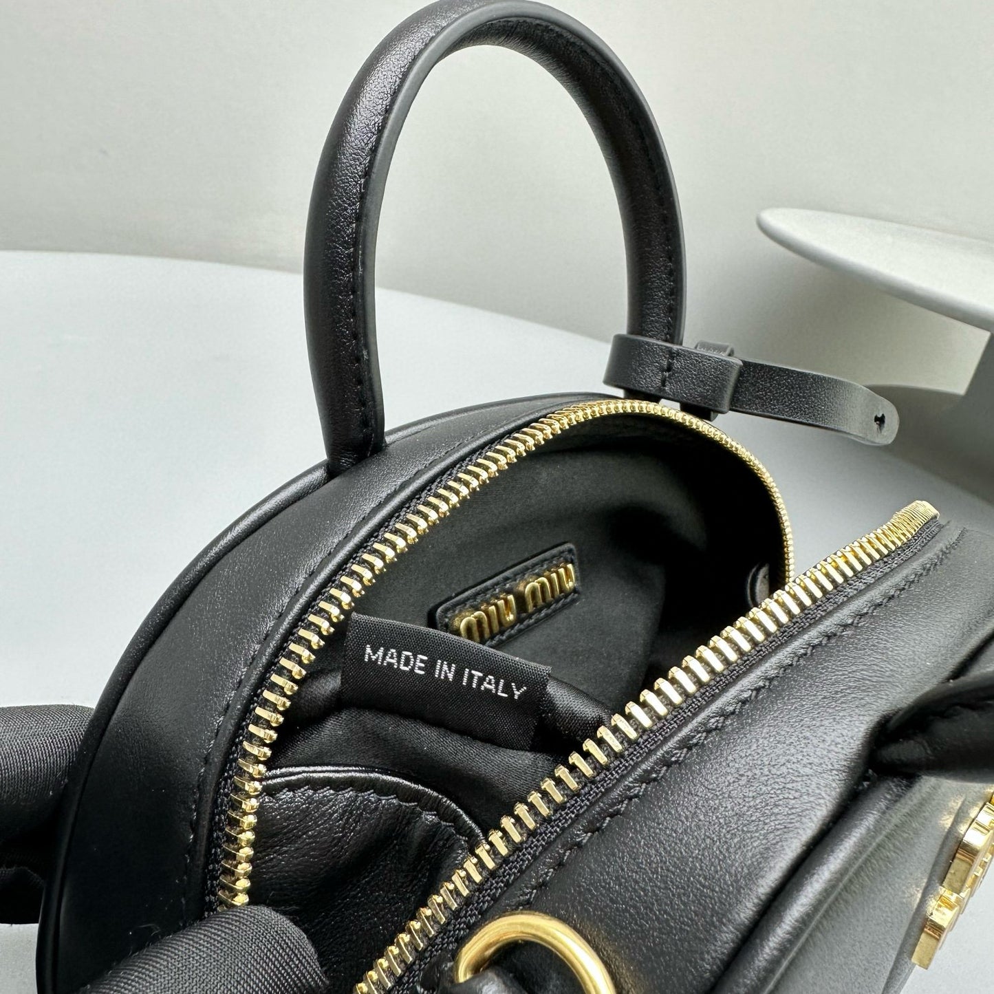 MIU M LEATHER TOP HANDLE BAG