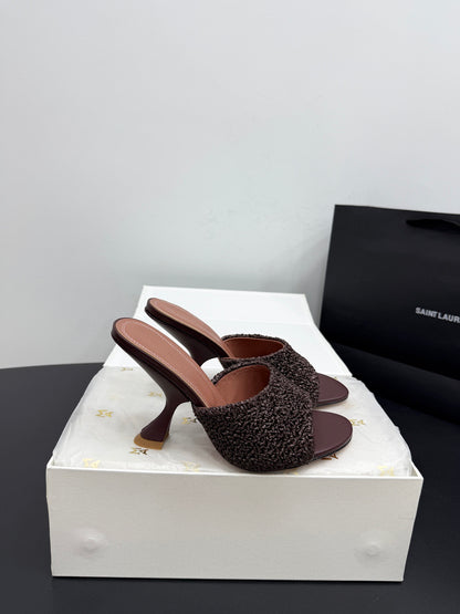 AMINA M HEELS