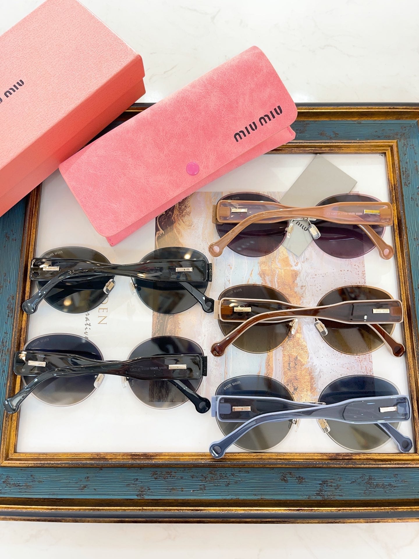 MIU M SUNGLASSES