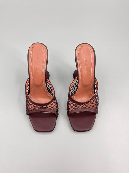 AMINA M HEELS
