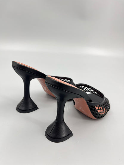 AMINA M HEELS