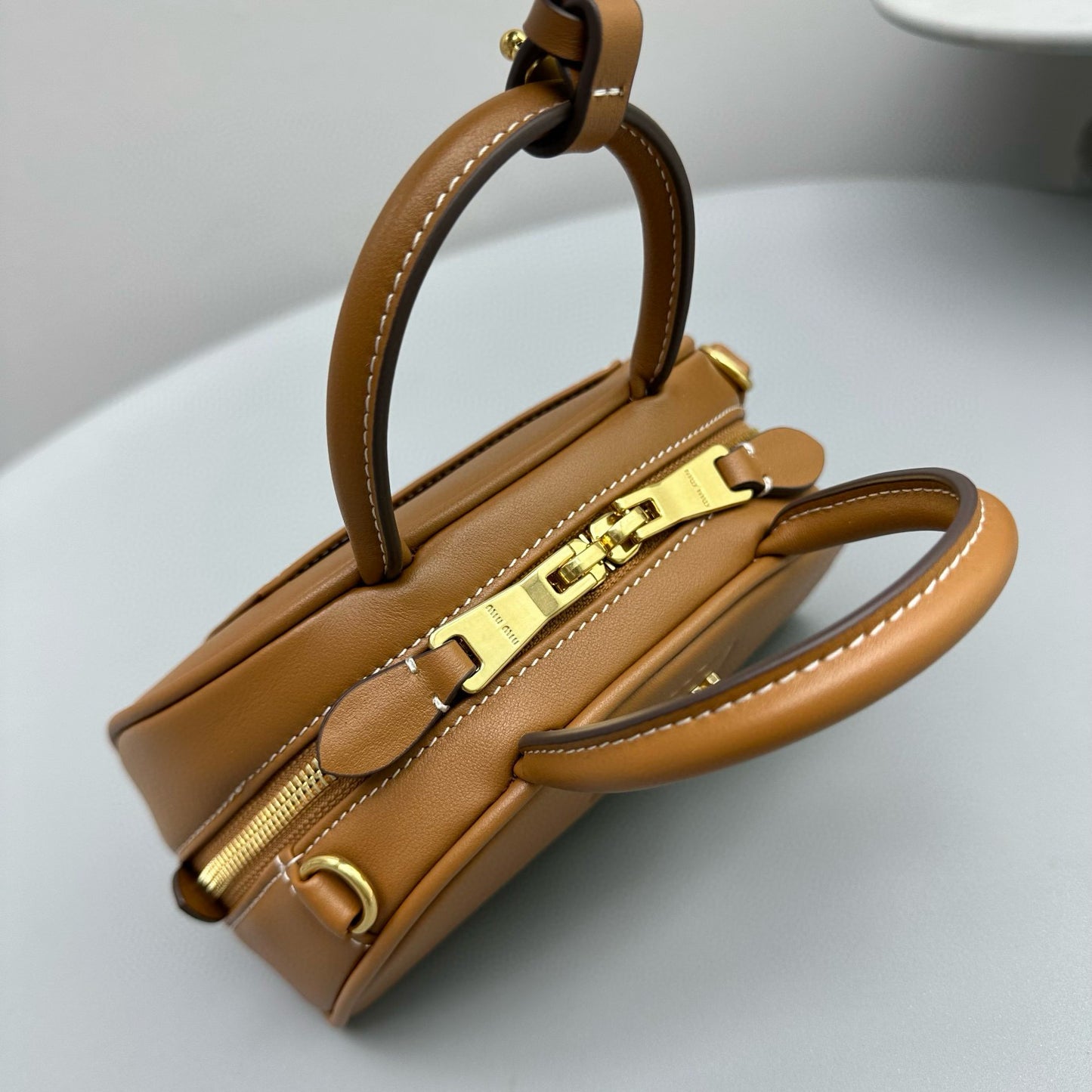 MIU M LEATHER TOP HANDLE BAG