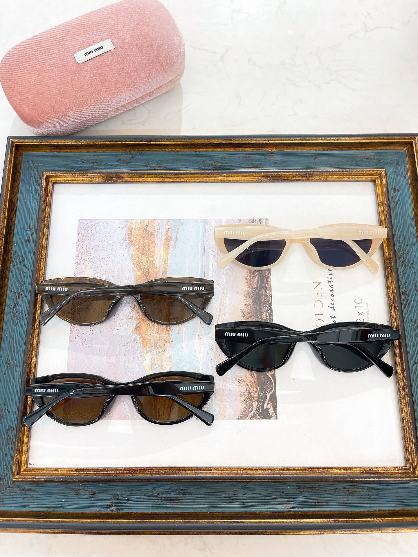 MIU M SUNGLASSES